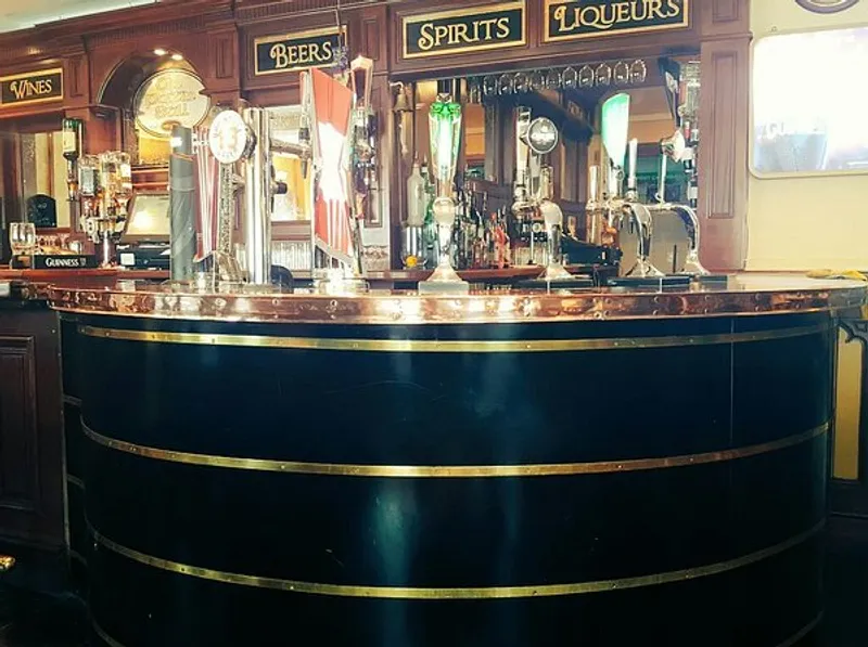 Traditional copper-topped bar at An Poitin Still